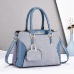 Elegant Women’s Handbag with Shoulder Strap & Mini Pouch - Image 2